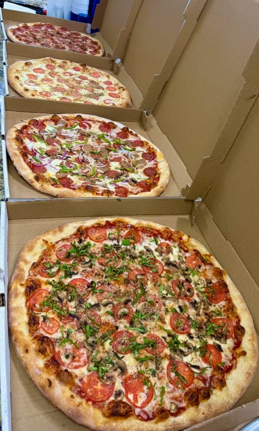 Pizzas boxed and ready to go