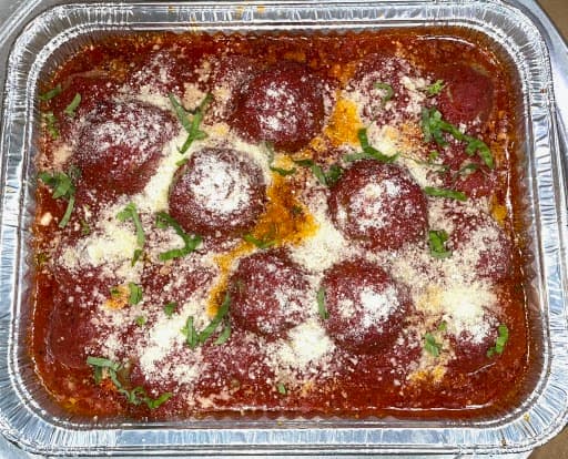 Meatballs in marinara catering tray