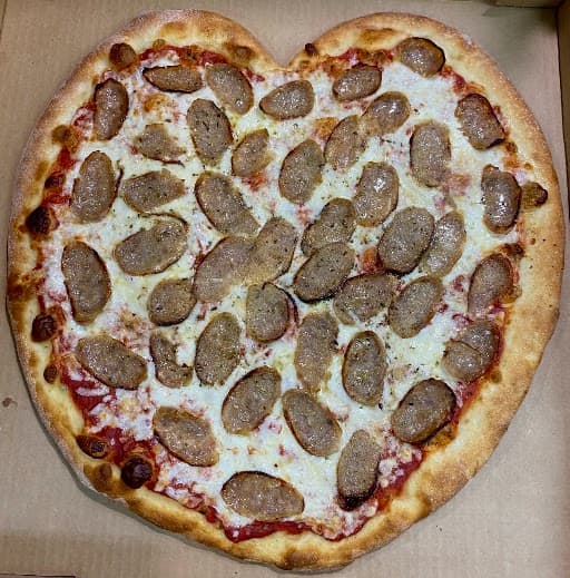 Heart-shaped sausage pizza