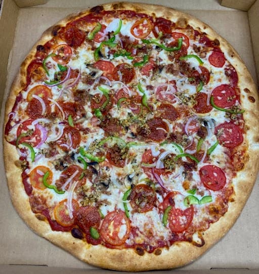 Pizza with pepperoni, tomatoes, peppers and onions