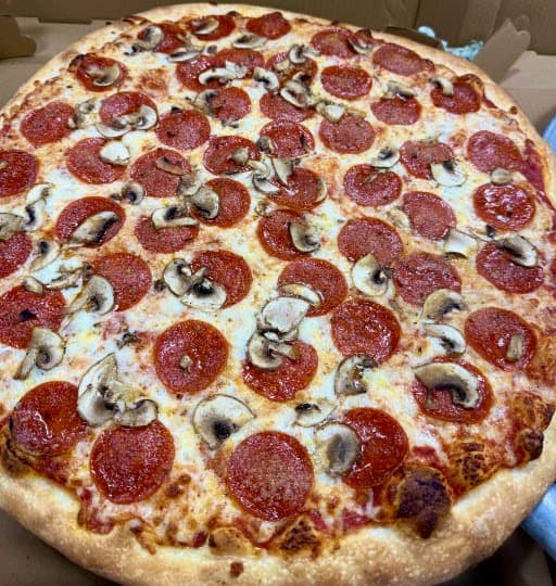 Pepperoni and mushroom pizza