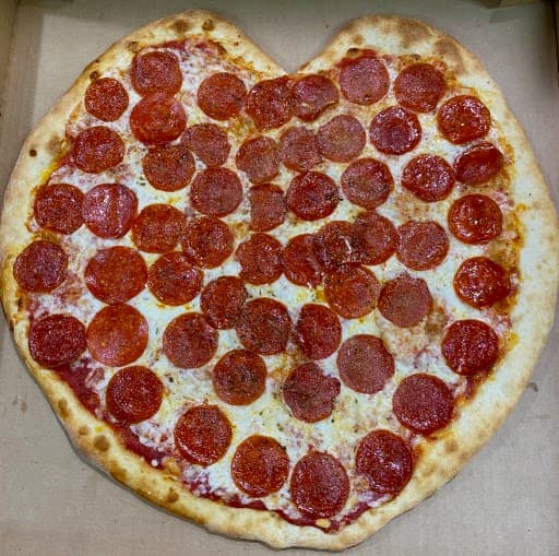 Heart-shaped pepperoni pizza